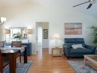 Discover Florida living in this immaculately maintained heated on Rotonda Golf and Country Club The Palms Course in Florida - for sale on GolfHomes.com, golf home, golf lot