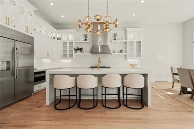 Set on a private 2.3-acre creek-lined homesite in the on Echelon Golf Club in Georgia - for sale on GolfHomes.com, golf home, golf lot