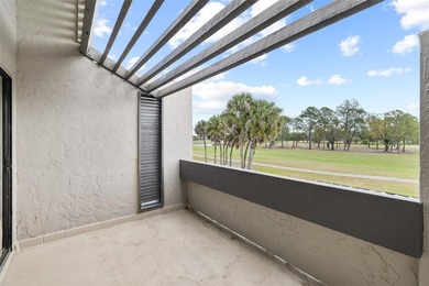 Turnkey Twin Lakes townhome with breathtaking views from BOTH on Carrollwood Country Club in Florida - for sale on GolfHomes.com, golf home, golf lot