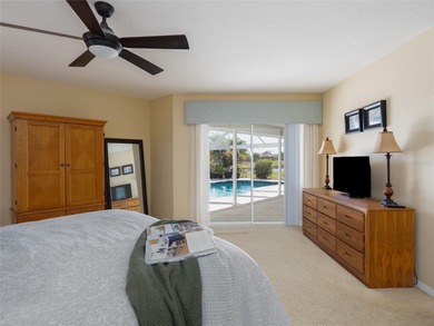 Discover Florida living in this immaculately maintained heated on Rotonda Golf and Country Club The Palms Course in Florida - for sale on GolfHomes.com, golf home, golf lot