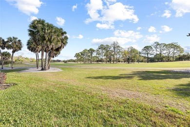 Turnkey Twin Lakes townhome with breathtaking views from BOTH on Carrollwood Country Club in Florida - for sale on GolfHomes.com, golf home, golf lot
