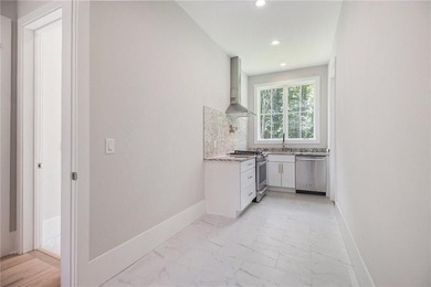 Set on a private 2.3-acre creek-lined homesite in the on Echelon Golf Club in Georgia - for sale on GolfHomes.com, golf home, golf lot