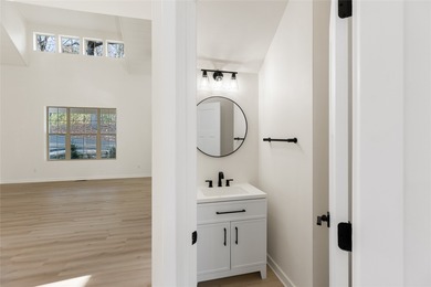 Nestled in the Holly Forest community of Sapphire, North on Sapphire National Golf Club in North Carolina - for sale on GolfHomes.com, golf home, golf lot