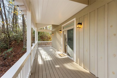 Nestled in the Holly Forest community of Sapphire, North on Sapphire National Golf Club in North Carolina - for sale on GolfHomes.com, golf home, golf lot