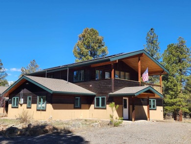 Nestled among tall Ponderosa Pine trees and less than one hour on The Divide Ranch and Club in Colorado - for sale on GolfHomes.com, golf home, golf lot