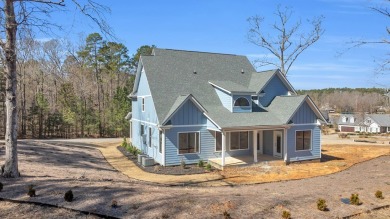 Absolutely spectacular Lake View home in the stunning Newport on The Links At Stoney Point in South Carolina - for sale on GolfHomes.com, golf home, golf lot