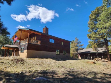 Nestled among tall Ponderosa Pine trees and less than one hour on The Divide Ranch and Club in Colorado - for sale on GolfHomes.com, golf home, golf lot