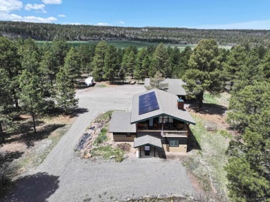 Nestled among tall Ponderosa Pine trees and less than one hour on The Divide Ranch and Club in Colorado - for sale on GolfHomes.com, golf home, golf lot