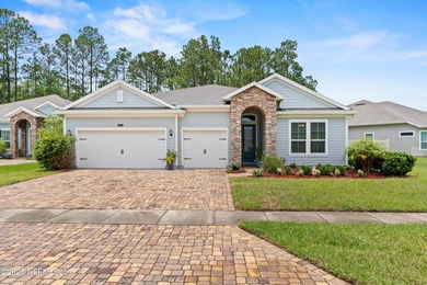 Welcome to this 3-car garage Palencia home with a split on The Palencia Club in Florida - for sale on GolfHomes.com, golf home, golf lot