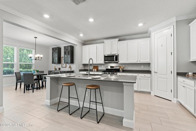 Welcome to this 3-car garage Palencia home with a split on The Palencia Club in Florida - for sale on GolfHomes.com, golf home, golf lot