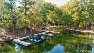 Discover unparalleled luxury and elegance in this brand-new on Reynolds Lake Oconee - The Oconee in Georgia - for sale on GolfHomes.com, golf home, golf lot