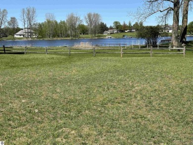 Lake view at Lake Isabella. Waterfront Birch Park with a sandy on The Pines Golf Course at Lake Isabella in Michigan - for sale on GolfHomes.com, golf home, golf lot