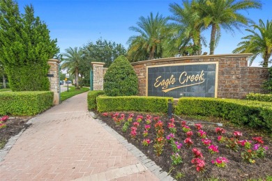 Located in the prestigious Eagle Creek Golf Community of Lake on Eagle Creek Golf Club in Florida - for sale on GolfHomes.com, golf home, golf lot