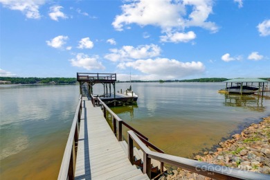 Indulge in lakeside luxury within this meticulously renovated on Tega Cay Golf Club in South Carolina - for sale on GolfHomes.com, golf home, golf lot