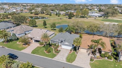 GOLF COURSE AND POND FRONT! GOLF CART INCLUDED. BOND PAID on Churchill Greens Executive Golf Course in Florida - for sale on GolfHomes.com, golf home, golf lot