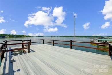 Indulge in lakeside luxury within this meticulously renovated on Tega Cay Golf Club in South Carolina - for sale on GolfHomes.com, golf home, golf lot