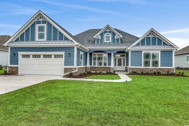 This brand-new custom home boasts 5 spacious bedrooms and 4 on Wild Wing Plantation in South Carolina - for sale on GolfHomes.com, golf home, golf lot