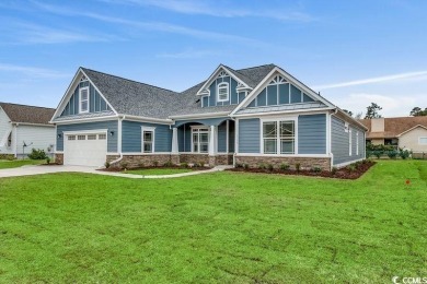 This brand-new custom home boasts 5 spacious bedrooms and 4 on Wild Wing Plantation in South Carolina - for sale on GolfHomes.com, golf home, golf lot