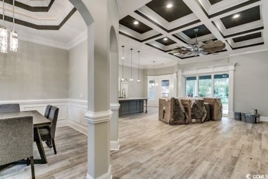 This brand-new custom home boasts 5 spacious bedrooms and 4 on Wild Wing Plantation in South Carolina - for sale on GolfHomes.com, golf home, golf lot