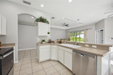 This beautiful single-level home features three bedrooms plus a on Stoneybrook Golf Club At Heritage Harbour in Florida - for sale on GolfHomes.com, golf home, golf lot