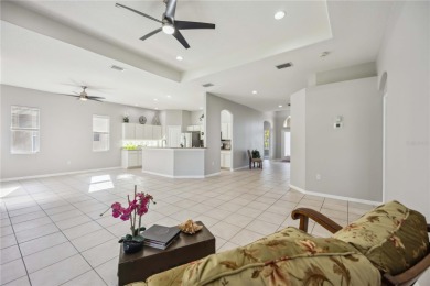 This beautiful single-level home features three bedrooms plus a on Stoneybrook Golf Club At Heritage Harbour in Florida - for sale on GolfHomes.com, golf home, golf lot