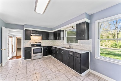 Discover this beautifully updated 1,400 sqft ranch, perfect for on Flushing Valley Golf and Country Club in Michigan - for sale on GolfHomes.com, golf home, golf lot