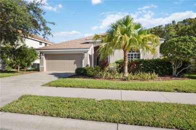 This beautiful single-level home features three bedrooms plus a on Stoneybrook Golf Club At Heritage Harbour in Florida - for sale on GolfHomes.com, golf home, golf lot