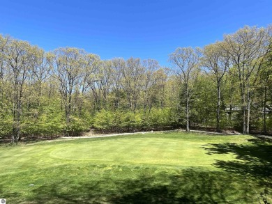 Surround yourself among nature and endless recreation on Manitou Passage Golf Club in Michigan - for sale on GolfHomes.com, golf home, golf lot