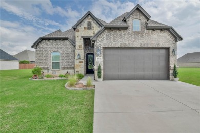 Gorgeous 3 bedroom 2.5 custom home in a quiet 55+ neighborhood on Harbor Lakes Golf Club in Texas - for sale on GolfHomes.com, golf home, golf lot