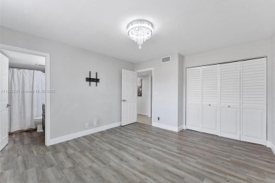 Updated condo in Boca Pointe offering natural light, comfort on Boca Pointe Country Club in Florida - for sale on GolfHomes.com, golf home, golf lot