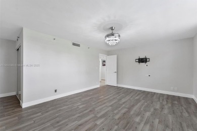 Updated condo in Boca Pointe offering natural light, comfort on Boca Pointe Country Club in Florida - for sale on GolfHomes.com, golf home, golf lot