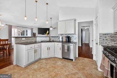Welcome to this charming 3 bedroom, 2 bath ranch home with a on Summergrove Golf Club in Georgia - for sale on GolfHomes.com, golf home, golf lot