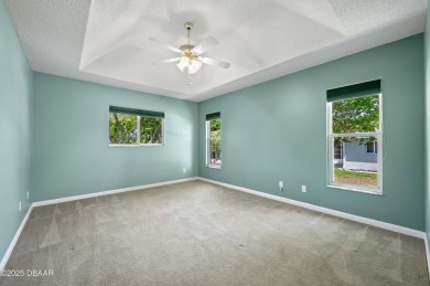 Welcome to your new home on the 5th green in Ocala Palms! This on Trilogy at Ocala Preserve in Florida - for sale on GolfHomes.com, golf home, golf lot