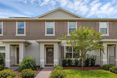 Fall in love with this stylish DR Horton *Ibis* townhome in the on Orange County National Golf Center and Lodge in Florida - for sale on GolfHomes.com, golf home, golf lot