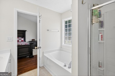 Welcome to this charming 3 bedroom, 2 bath ranch home with a on Summergrove Golf Club in Georgia - for sale on GolfHomes.com, golf home, golf lot