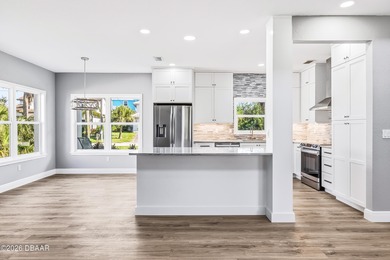 Just 400 steps from the ocean, this fully remodeled residence on Harbour Village Golf and Yacht Club in Florida - for sale on GolfHomes.com, golf home, golf lot