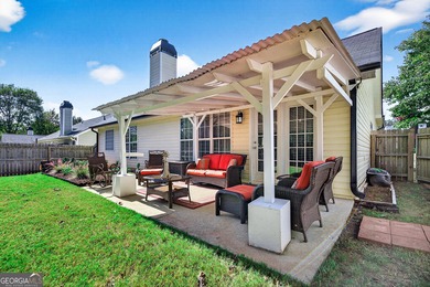 Welcome to this charming 3 bedroom, 2 bath ranch home with a on Summergrove Golf Club in Georgia - for sale on GolfHomes.com, golf home, golf lot