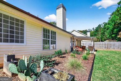 Welcome to this charming 3 bedroom, 2 bath ranch home with a on Summergrove Golf Club in Georgia - for sale on GolfHomes.com, golf home, golf lot