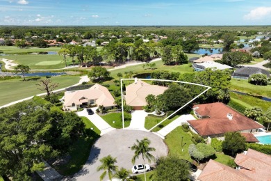 Discover luxury living in the heart of PGA National's on PGA National Golf Club in Florida - for sale on GolfHomes.com, golf home, golf lot
