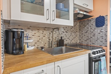 Wake Up to the Waves -- Fully Renovated 1BR Oceanfront Escape at on Midway Par-3 in South Carolina - for sale on GolfHomes.com, golf home, golf lot