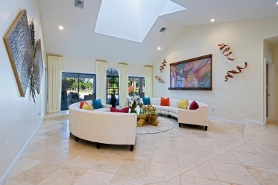 Discover luxury living in the heart of PGA National's on PGA National Golf Club in Florida - for sale on GolfHomes.com, golf home, golf lot