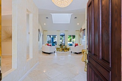 Discover luxury living in the heart of PGA National's on  in Florida - for sale on GolfHomes.com, golf home, golf lot