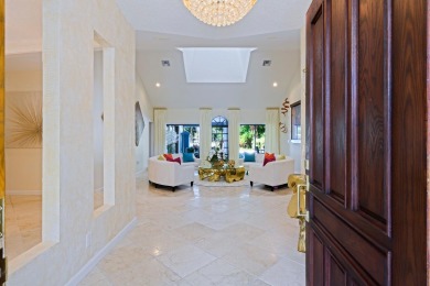 Discover luxury living in the heart of PGA National's on PGA National Golf Club in Florida - for sale on GolfHomes.com, golf home, golf lot