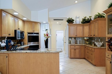 Discover luxury living in the heart of PGA National's on  in Florida - for sale on GolfHomes.com, golf home, golf lot