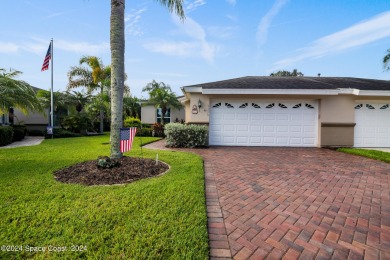 Discover unparalleled luxury in this charming villa nestled on a on Viera East Golf Club in Florida - for sale on GolfHomes.com, golf home, golf lot