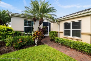 Discover unparalleled luxury in this charming villa nestled on a on Viera East Golf Club in Florida - for sale on GolfHomes.com, golf home, golf lot