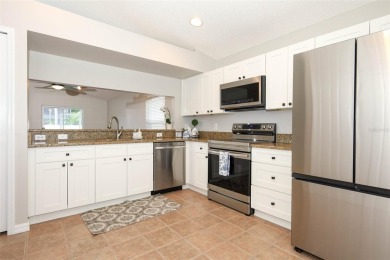CHARMING HOME IN THE RESORT-STYLE GATED COMMUNITY OF on Stoneybrook East Golf Club in Florida - for sale on GolfHomes.com, golf home, golf lot