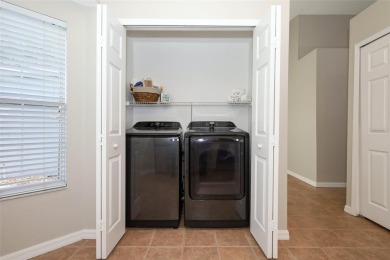 CHARMING HOME IN THE RESORT-STYLE GATED COMMUNITY OF on Stoneybrook East Golf Club in Florida - for sale on GolfHomes.com, golf home, golf lot