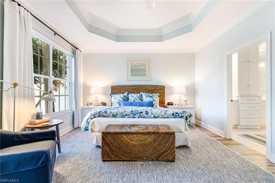 This stunning southern-exposure end unit offers some of the most on West Bay Beach and Golf Club in Florida - for sale on GolfHomes.com, golf home, golf lot