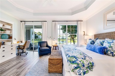 This stunning southern-exposure end unit offers some of the most on West Bay Beach and Golf Club in Florida - for sale on GolfHomes.com, golf home, golf lot